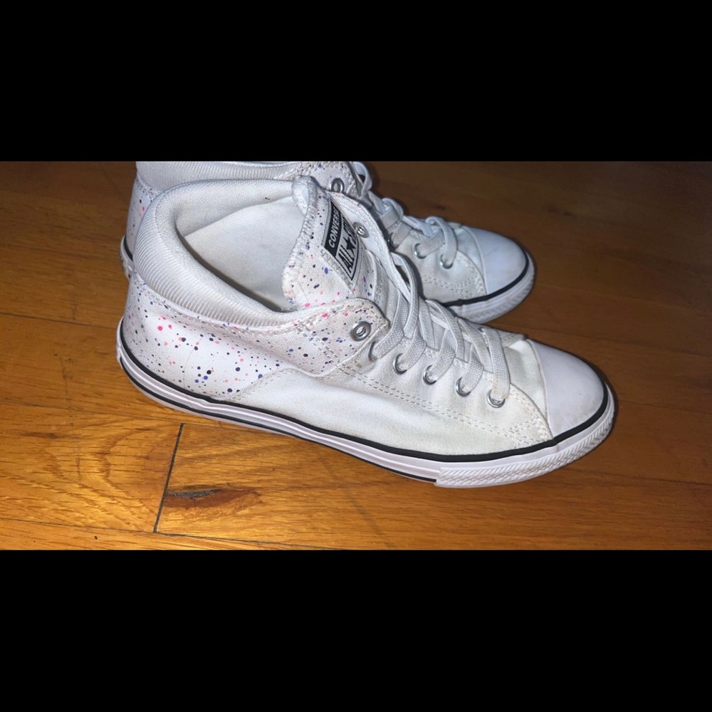 Converse shoes size 5 and white galaxy theme.